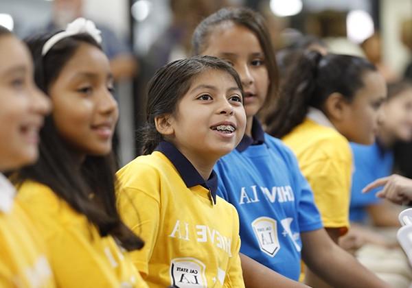 Children in Achieve LA shirts